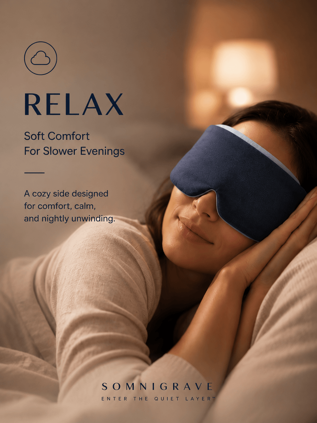 A woman lying in bed wearing a dark blue Somnigrave sleep mask, with warm ambient lighting in the background and promotional text on the left side reading 'RELAX Soft Comfort For Slower Evenings' and 'SOMNIGRAVE ENTER THE QUIET LAYER'.