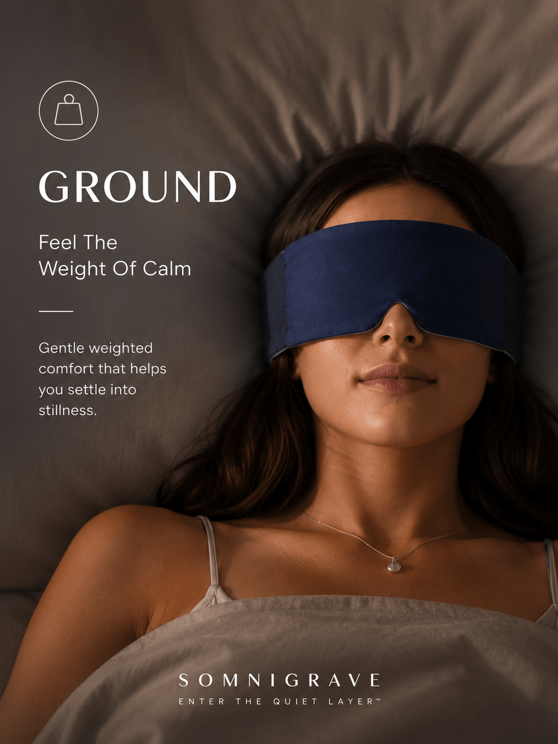 A woman lying in bed wearing a dark blue sleep mask, with promotional text for Ground, Feel The Weight Of Clam. Somnigrave, Enter The Quiet Layer on a dark gray background.